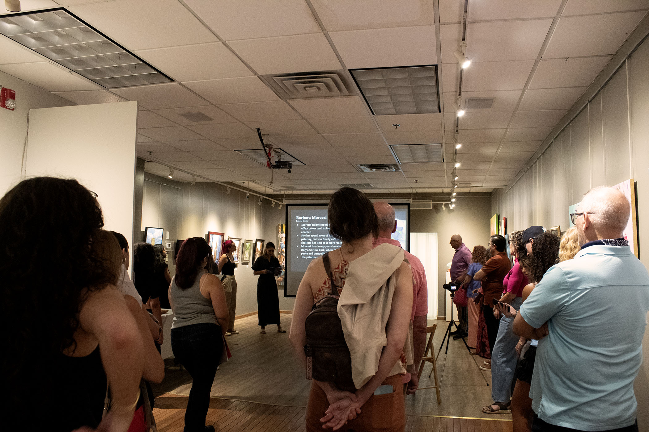 People looking at art